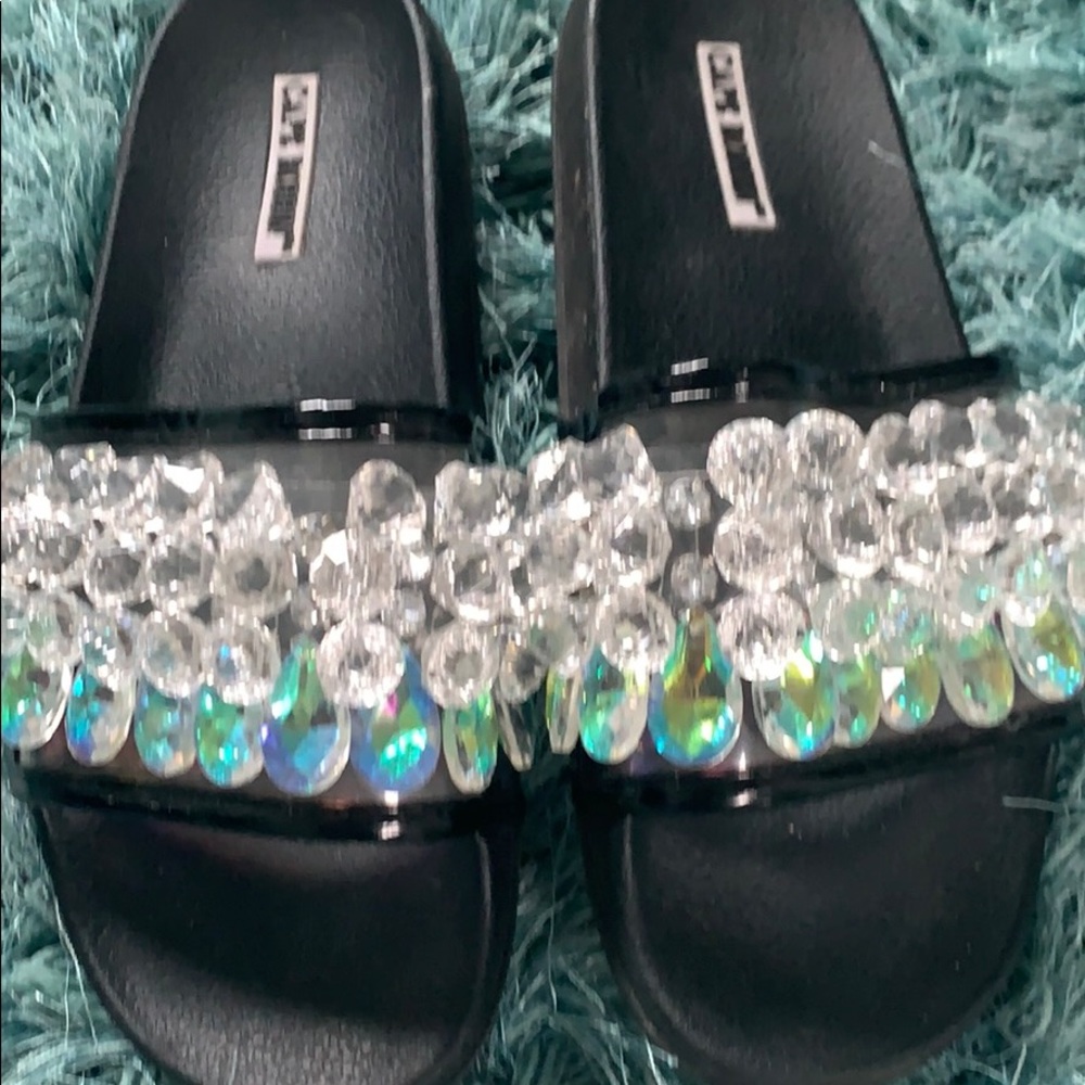 Super cute bedazzled flip flops. Worn once!